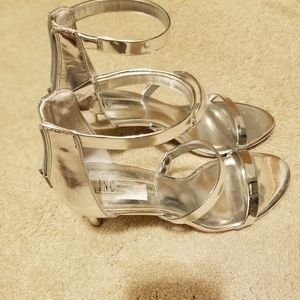 Metallic silver heels